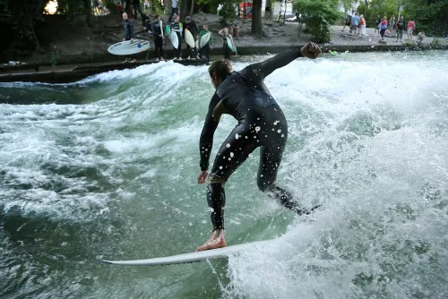 Eisbachwelle in Munich, stop 5 on the self-guided walking tour